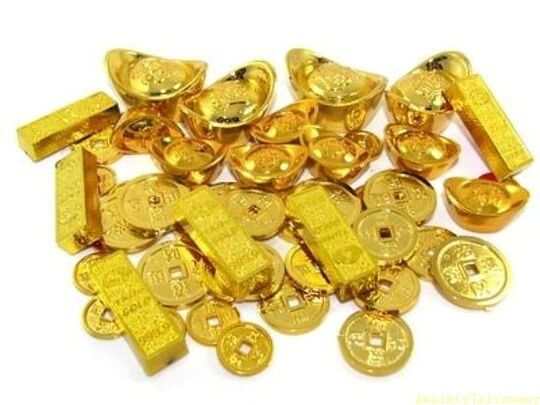 gold bars and coins as an amulet of fortune
